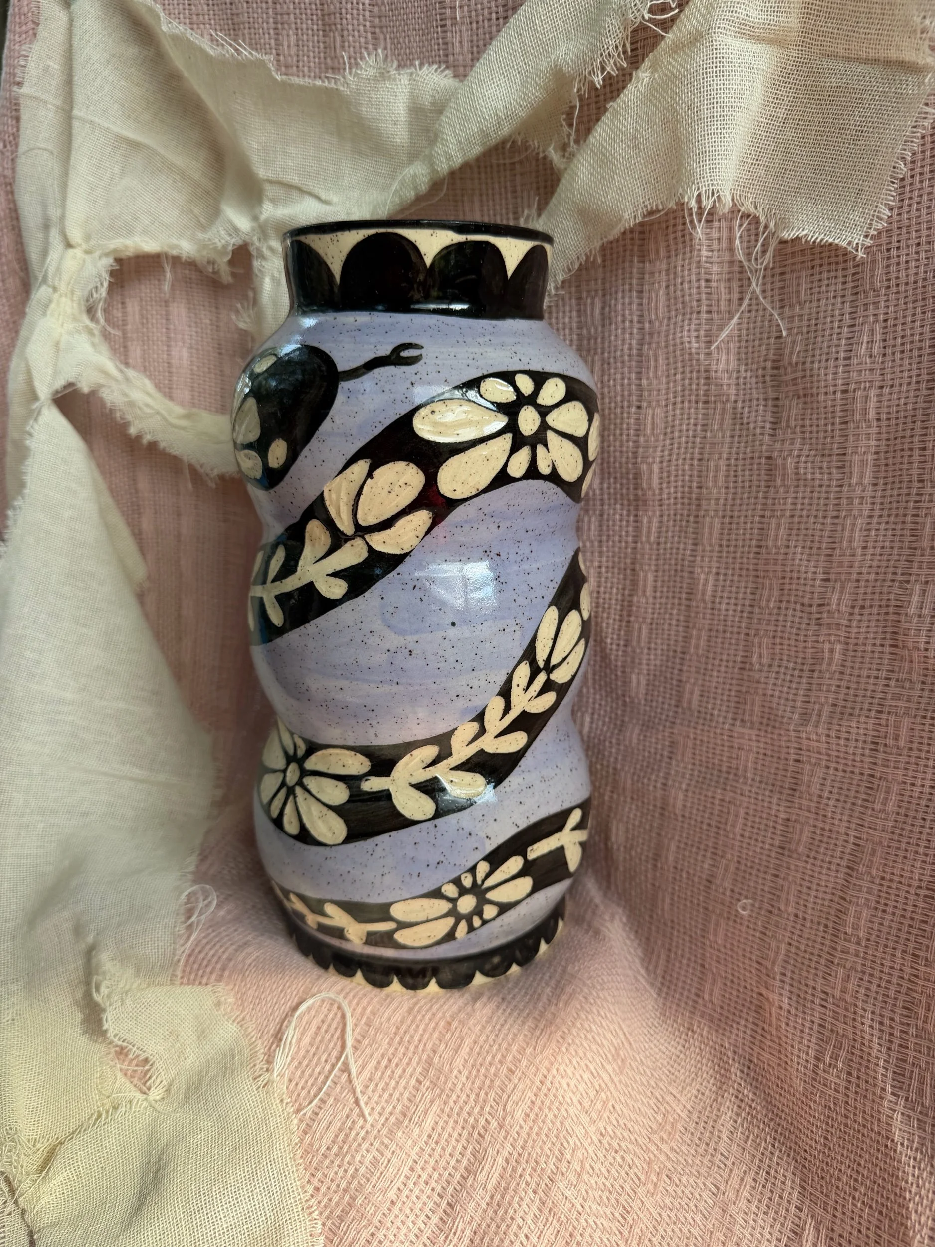 Floral snake vase
